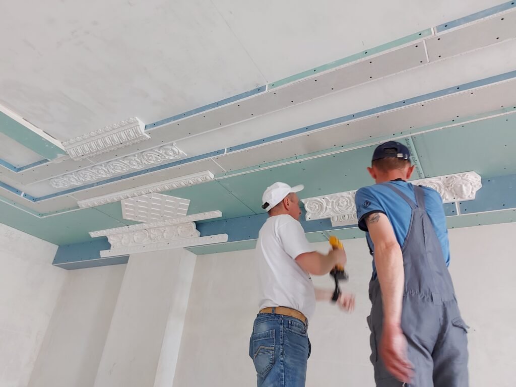 Decorative plaster cornices and ceiling roses installed in the UK